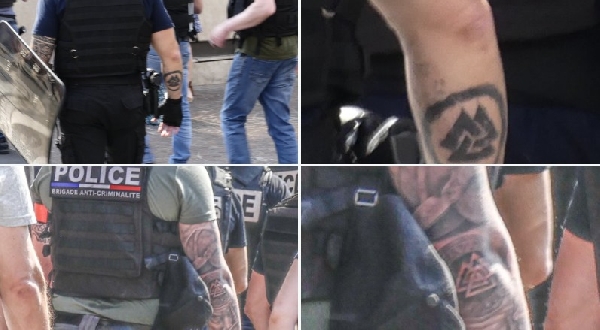 Des policiers photographiés avec des « valknut » tatoués sur les bras, l